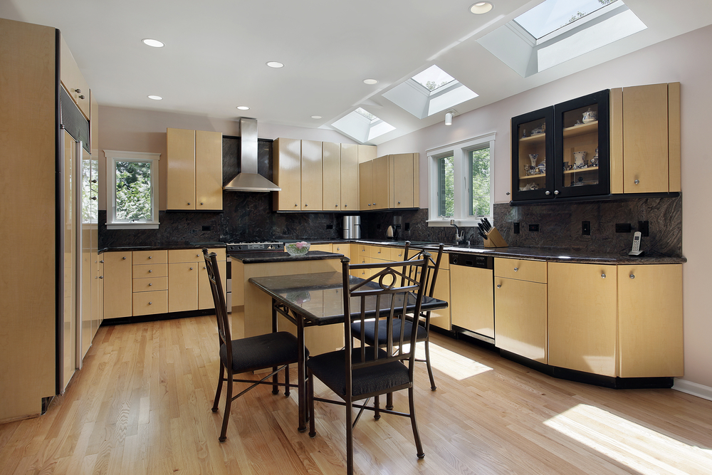 Kitchen In Modern Home With Three Skylights